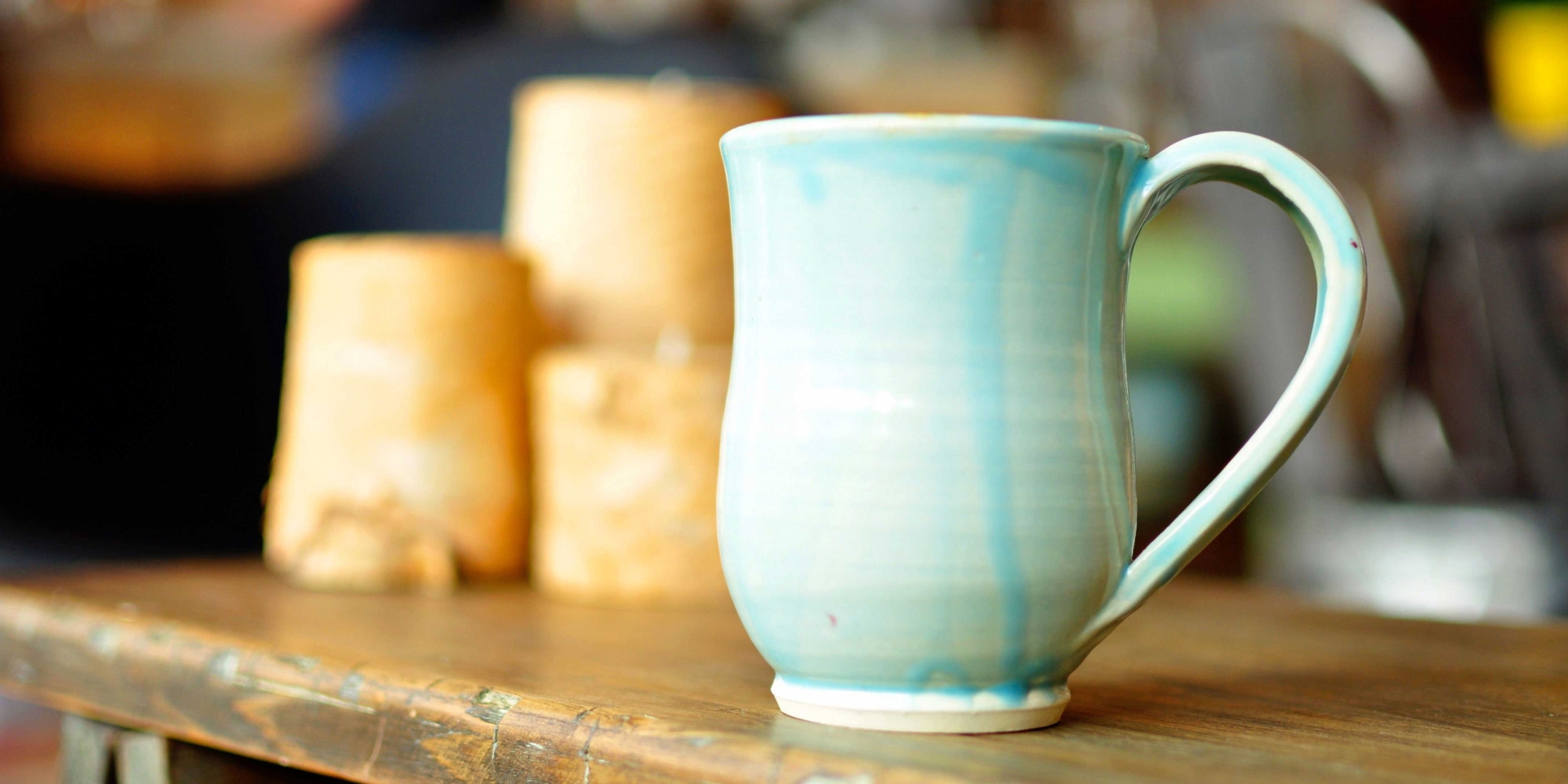 A ceramic mug with blue glaze