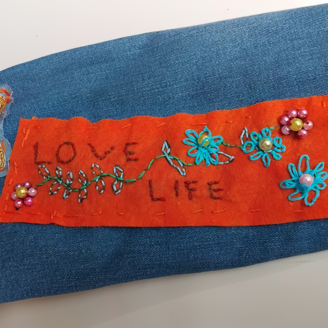 A patch on the denim jacket