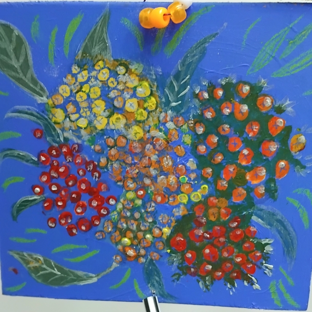 Painted flowers on a blue background